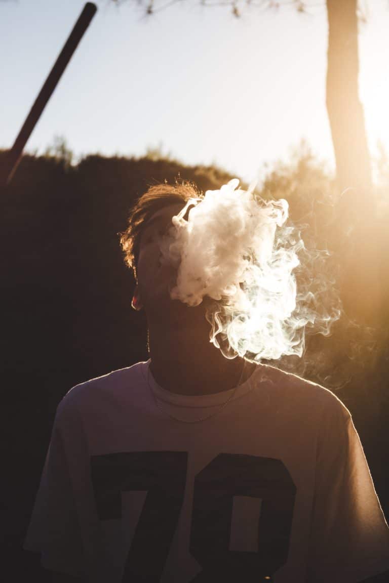 Picture of a guy smoking cannabis: learn how to get higher off of weed.