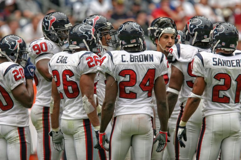 Image of a football team; the NFL has just changed its policy on players using cannabis in the offseason.